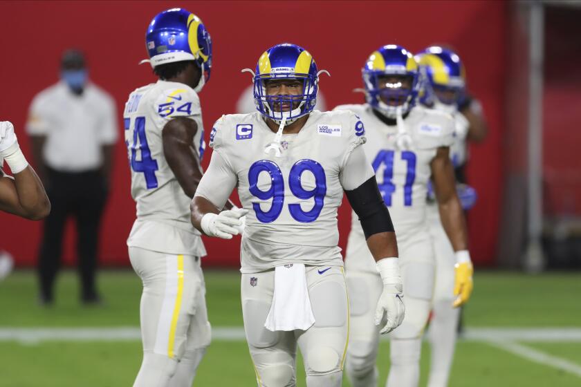 Los Angeles Rams defensive end Aaron Donald (99) before an NFL football game against the Tampa Bay Buccaneers Monday, Nov. 23, 2020, in Tampa, Fla. (AP Photo/Mark LoMoglio)