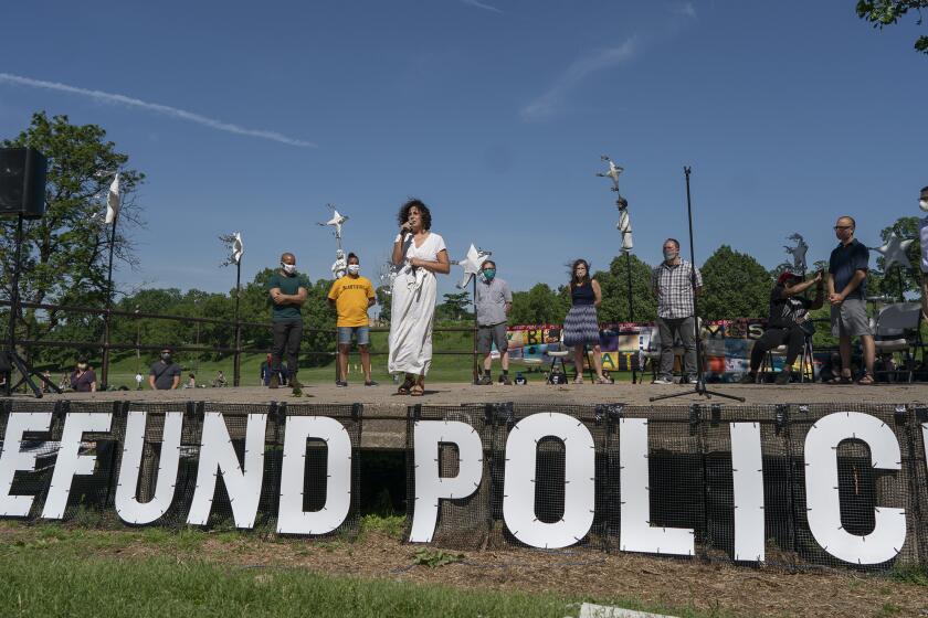 Alondra Cano, a City Council member, speaks during "The Path Forward" meeting at Powderhorn Park on Sunday, June 7, 2020, in Minneapolis. The focus of the meeting was the defunding of the Minneapolis Police Department. (Jerry Holt/Star Tribune via AP)