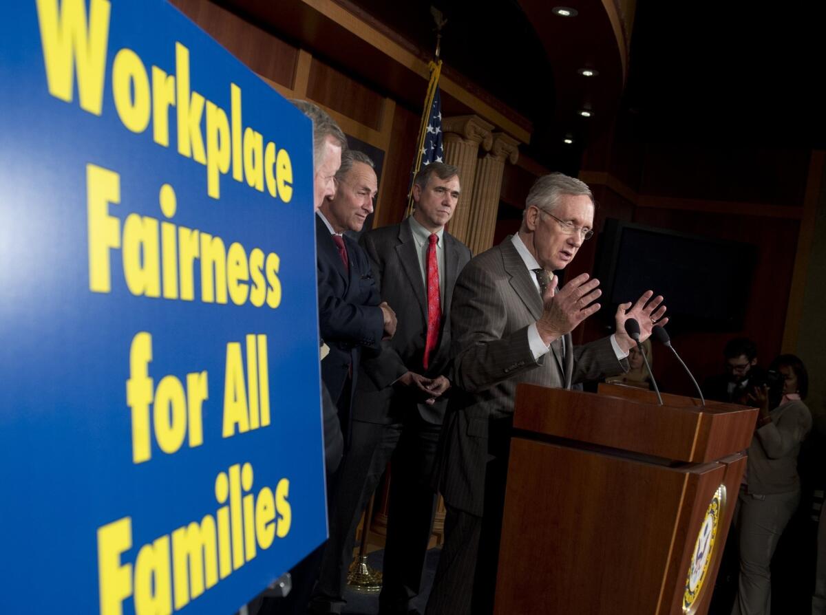A report by the Williams Institute at the UCLA School of Law says LGBT workplace discrimination is persistent and pervasive. Above, U.S. Senate Majority Leader Harry Reid (D-Nev.) speaks during a news conference shortly before the Senate approved legislation that would prohibit discrimination based on sexual orientation and gender identity.