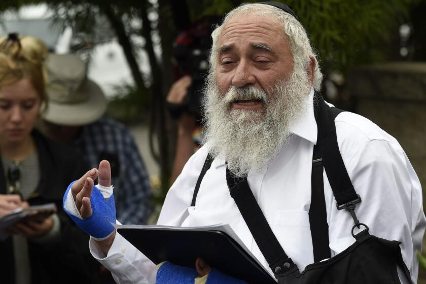 Rabbi Yisroel Goldstein speaks at a news conference at the Chabad of Poway synagogue, Sunday, April 28, 2019, in Poway, Calif. A man opened fire Saturday inside the synagogue near San Diego as worshippers celebrated the last day of a major Jewish holiday. (AP Photo/Denis Poroy)