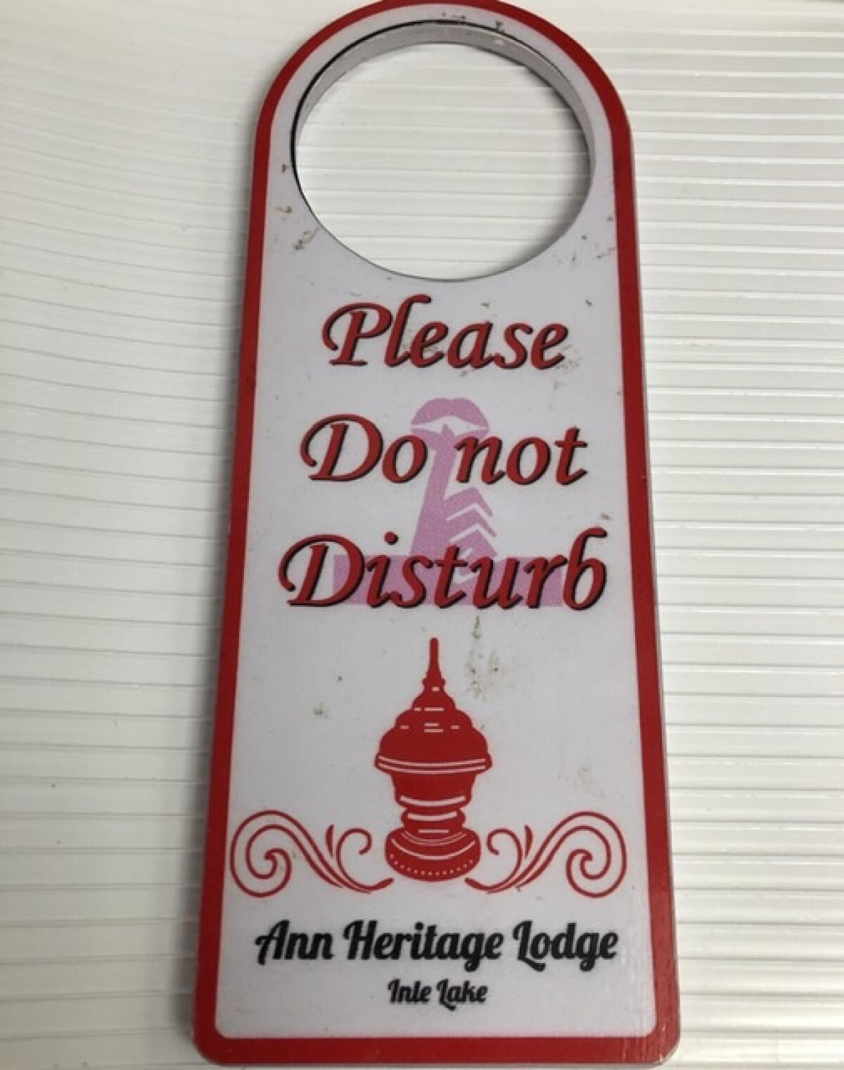 Hotel door notice, Myanmar.