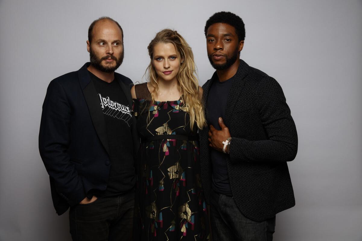 Fabrice Du Welz, left, Teresa Palmer and Chadwick Boseman of "Message from the King."