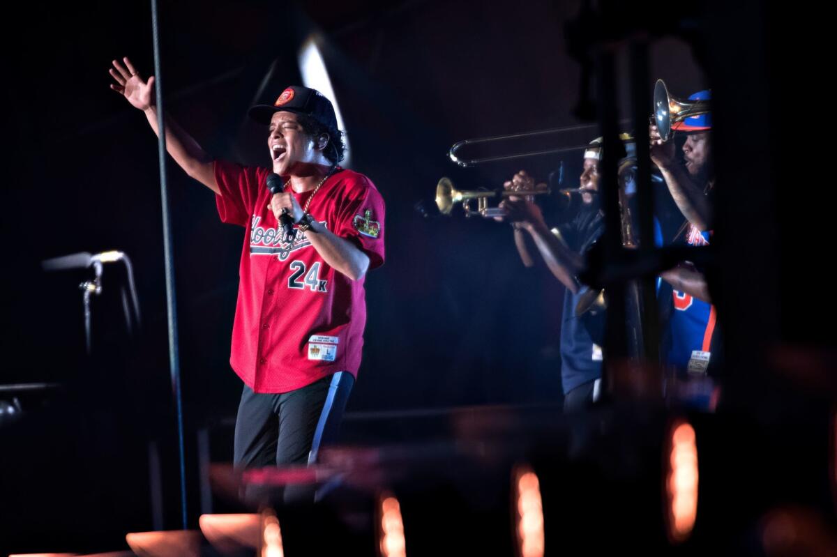 US singer Bruno Mars performs on stage during the Roskilde music festival on July 5, 2018 in Roskilde, Denmark.