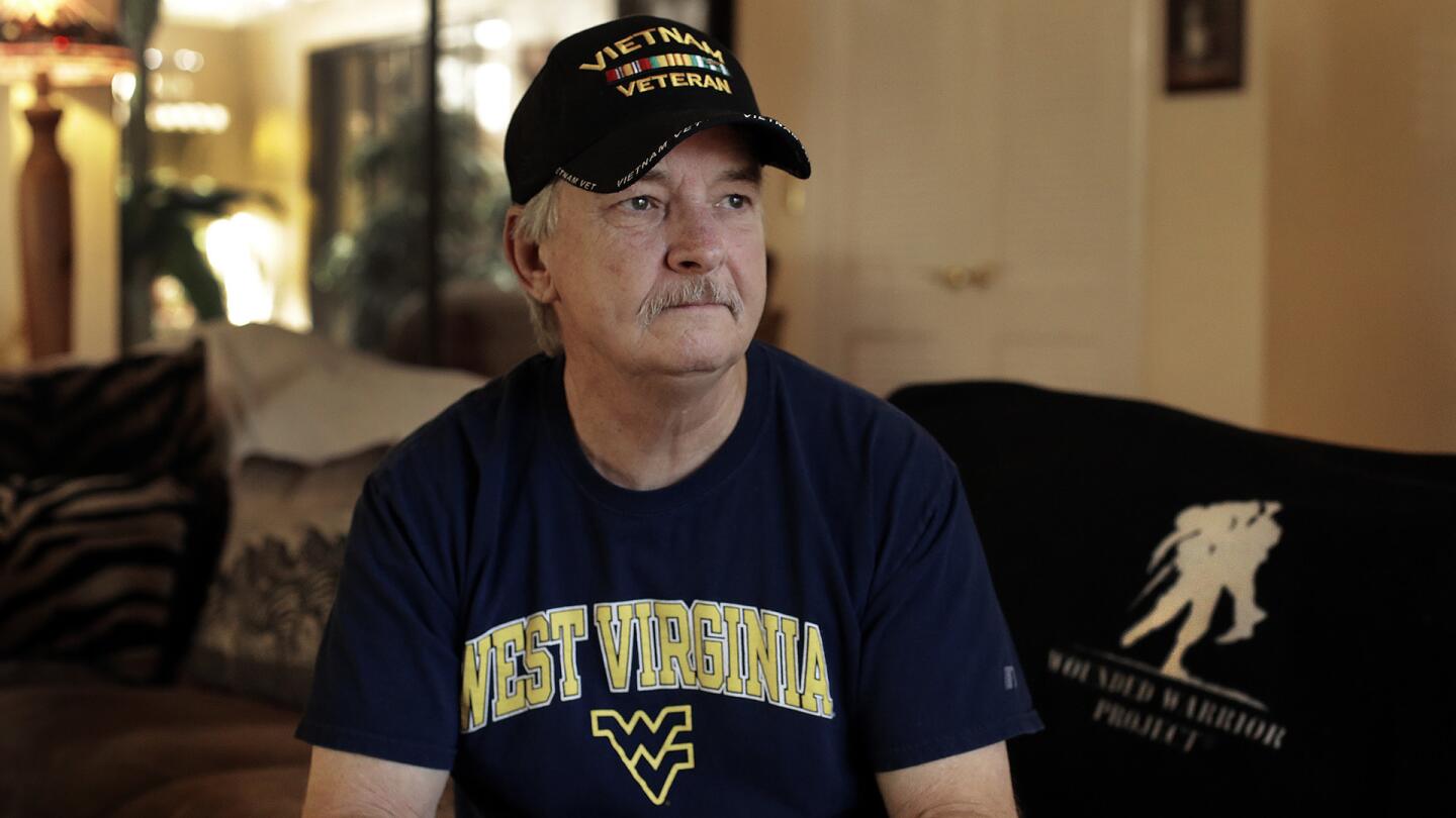 64-year-old Mike Baughman is among hundreds of veterans who have been diagnosed with a rare form of bile duct cancer that may be linked to their time in the service and an unexpected source: parasites in raw or poorly cooked river fish.