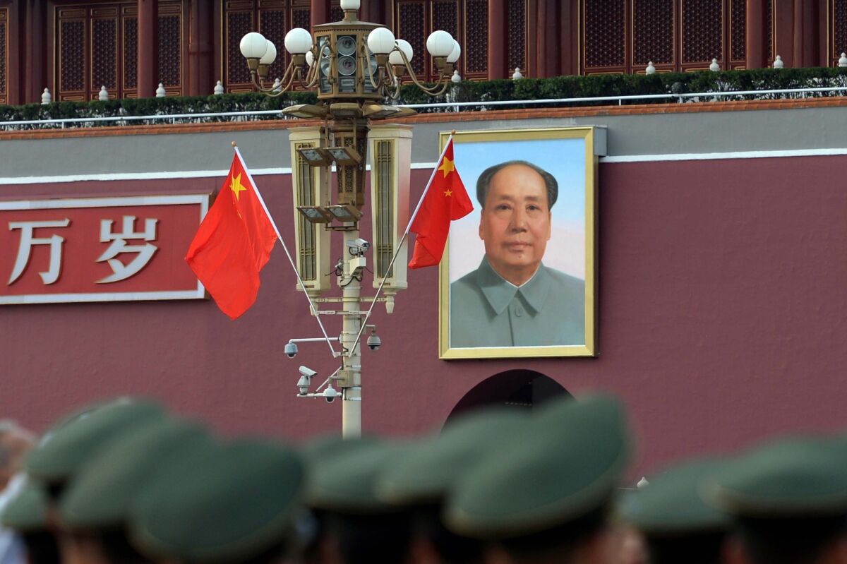 New Communist Party slogans in China are stressing "traditional" culture and values. Above, Tiananmen Gate.