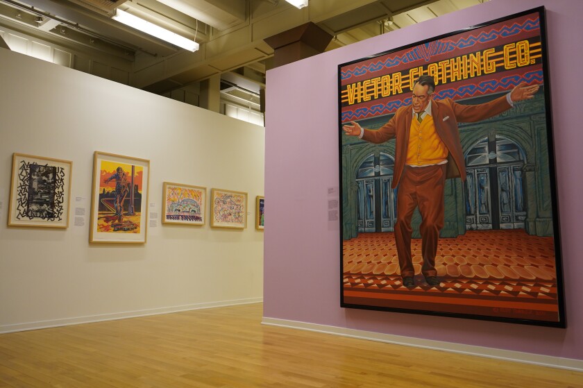 An installation in a gallery shows a painting in the foreground of a man standing with arms outstretched, one knee bent.