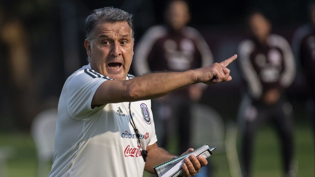 Mexico's national football team coach Gerardo "Tata" Martino conducts a training session at the High Performance Centre (CAR) in the outskirts of Mexico City, on Feb. 11.
