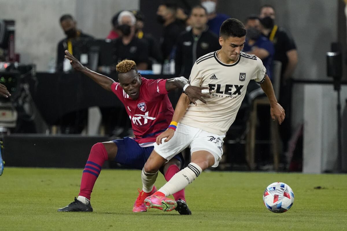 LAFC's Eduard Atuesta controls the ball next to Dallas FC forward Jader Obrian