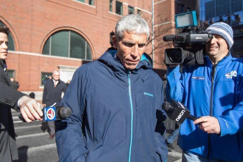 BOSTON, MA - MARCH 12: William "Rick" Singer leaves Boston Federal Court after being charged with racketeering conspiracy, money laundering conspiracy, conspiracy to defraud the United States, and obstruction of justice on March 12, 2019 in Boston, Massachusetts. Singer is among several charged in an alleged college admissions scam involving parents, ACT and SAT administrators and coaches at universities including Stanford, Georgetown, Yale, and the University of Southern California. (Photo by Scott Eisen/Getty Images) ** OUTS - ELSENT, FPG, CM - OUTS * NM, PH, VA if sourced by CT, LA or MoD ** ** OUTS - ELSENT, FPG, CM - OUTS * NM, PH, VA if sourced by CT, LA or MoD **