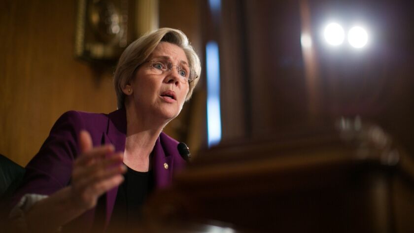 Sen. Elizabeth Warren (D-Mass.) questions witnesses during a Senate Banking, Housing and Urban Affairs Committee hearing on Wall Street reforms in 2013.