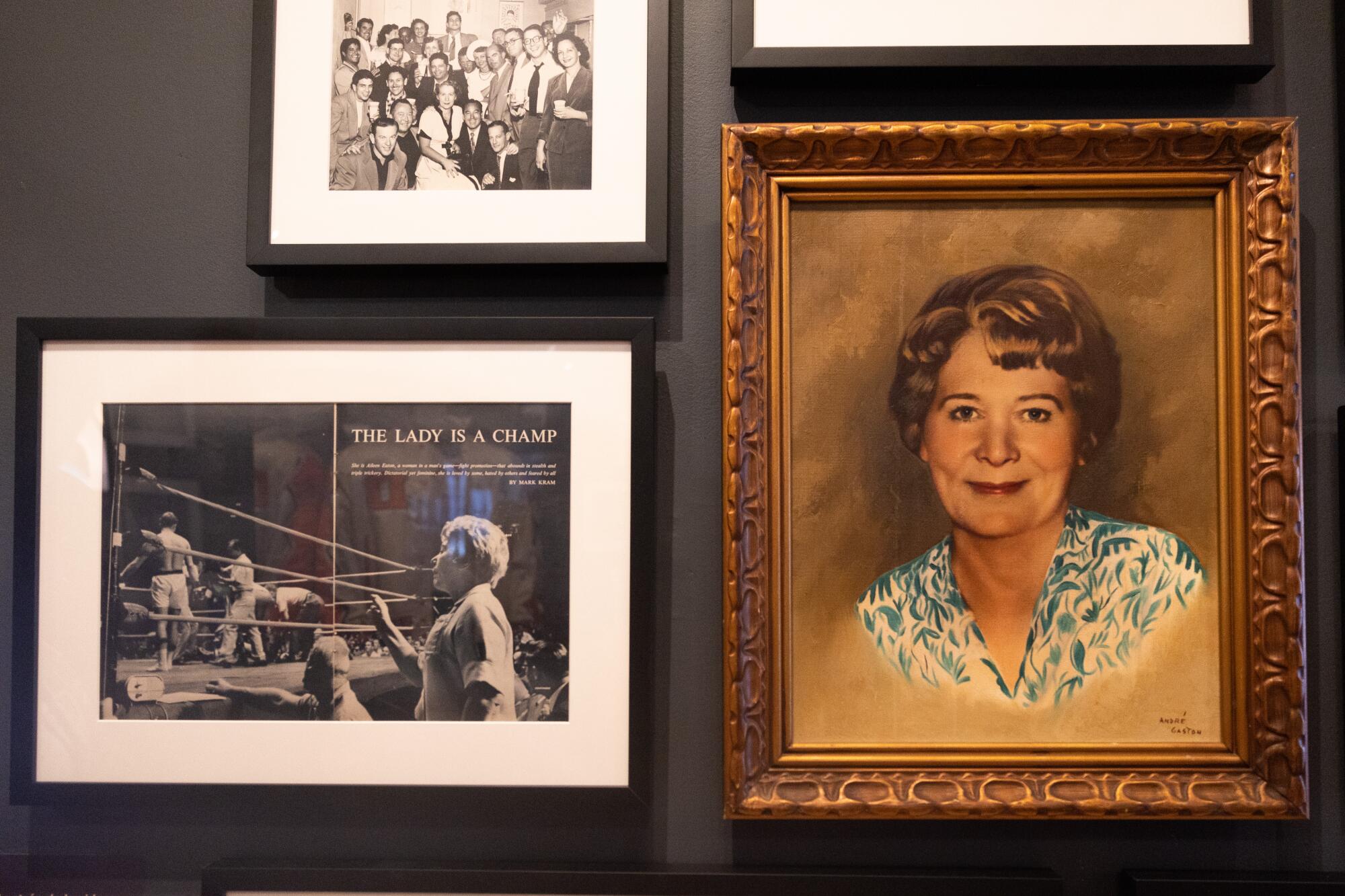 A photograph and painting of Aileen Eaton, who was active with the Olympic Auditorium from 1942-1980 hangs in the exhibit 
