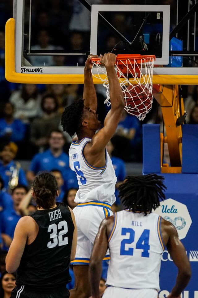 UCLA guard Chris Smith (5) dunks the ball against Long Beach State during the first half of a game Nov. 6 at Pauley Pavilion.