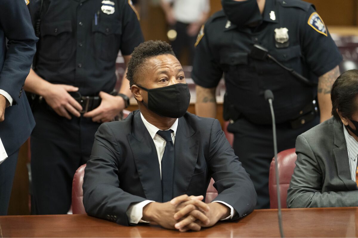Actor Cuba Gooding Jr. sits in court during a hearing in his sexual misconduct case, Thursday, Aug. 13, 2020, in New York. A judge ordered the courtroom outfitted with Plexiglas and other measures to prevent the spread of the coronavirus, which has delayed the trial indefinitely. (Steven Hirsch/New York Post via AP, Pool)
