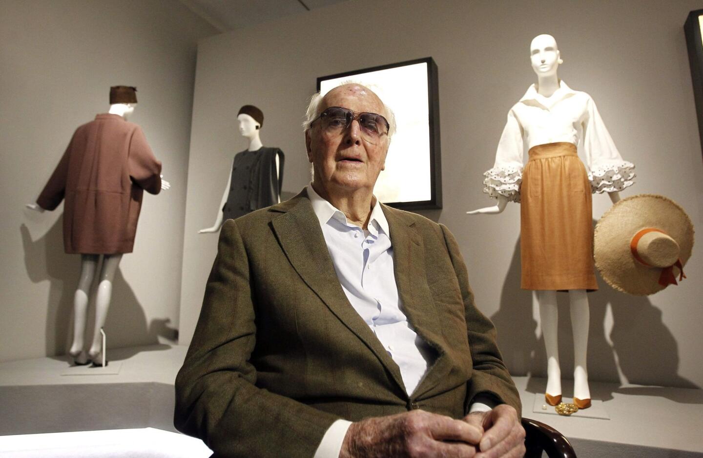 French designer Hubert de Givenchy in front of his creations during an interview on his exhibition "Hubert de Givenchy" at the Thyssen-Bornemisza Museum in Madrid.