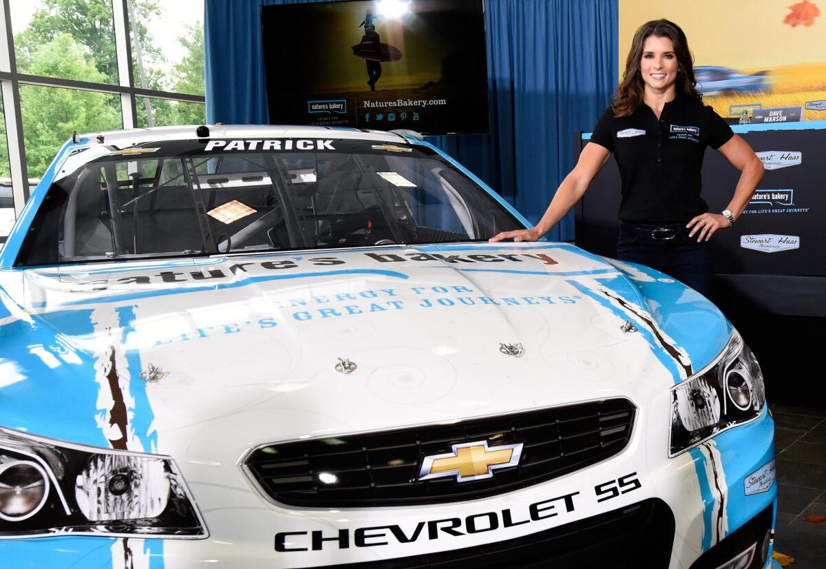 NASCAR driver Danica Patrick poses for a photo after announcing a multiyear sponsorship with Nature's Bakery on Tuesday.