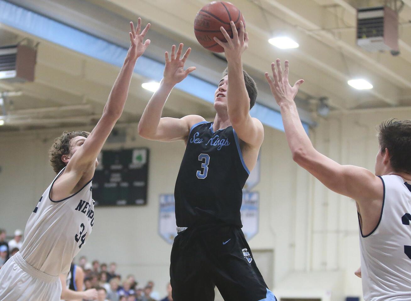 Photo Gallery: Corona del Mar vs. Newport Harbor in boys’ basketball