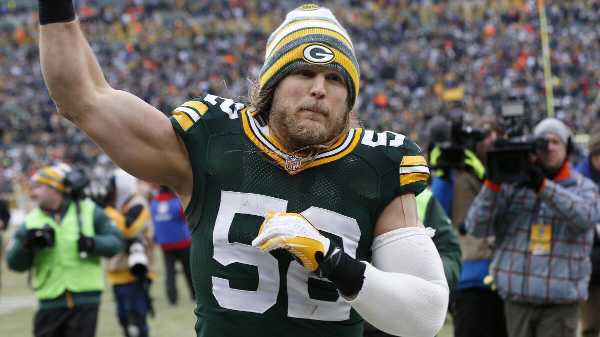 Green Bay Packers linebacker Clay Matthews celebrates the team's 26-21 win over the Dallas Cowboys in the NFC divisional playoffs Sunday.