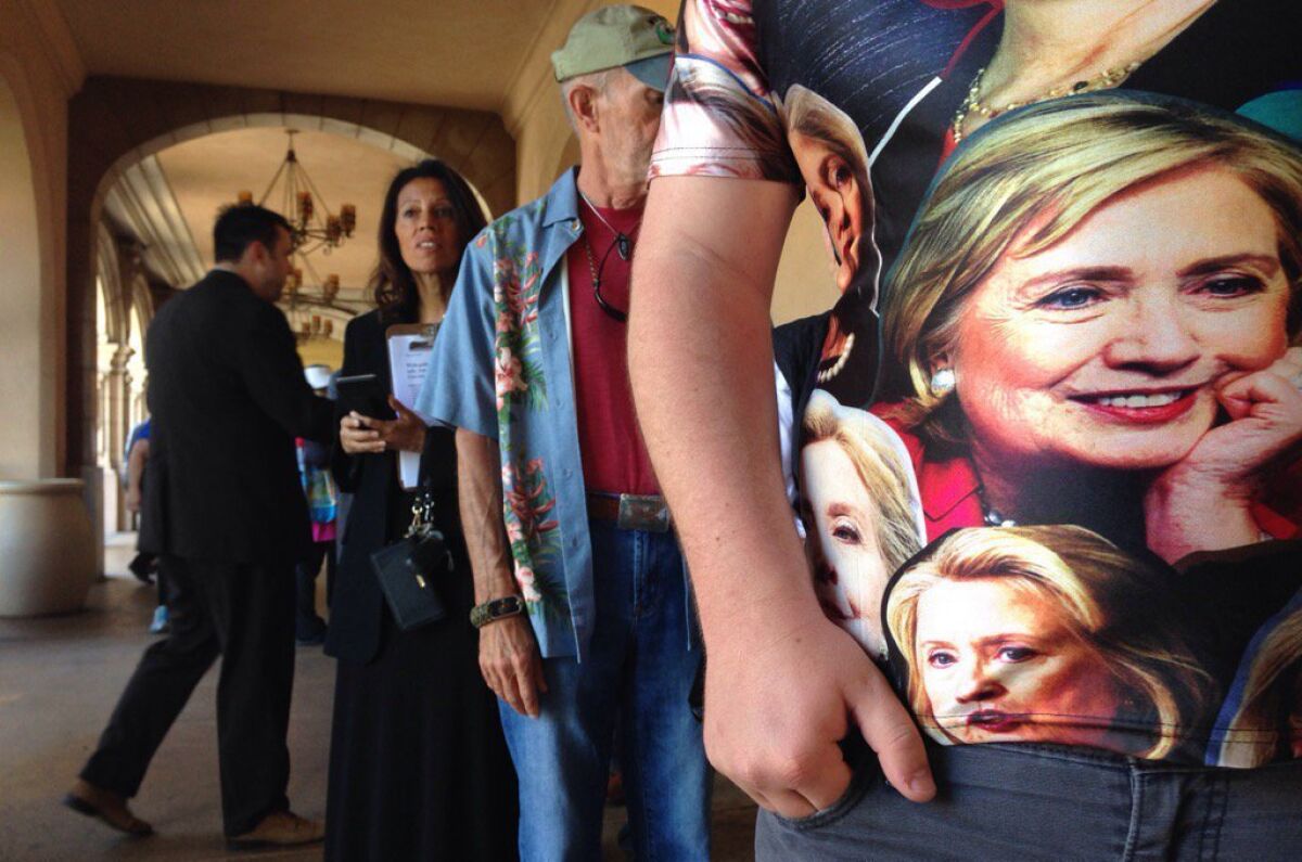 Jack Minnick of San Diego with his Hillary Clinton shirt waiting in line at Balboa Park. — John Gibbins