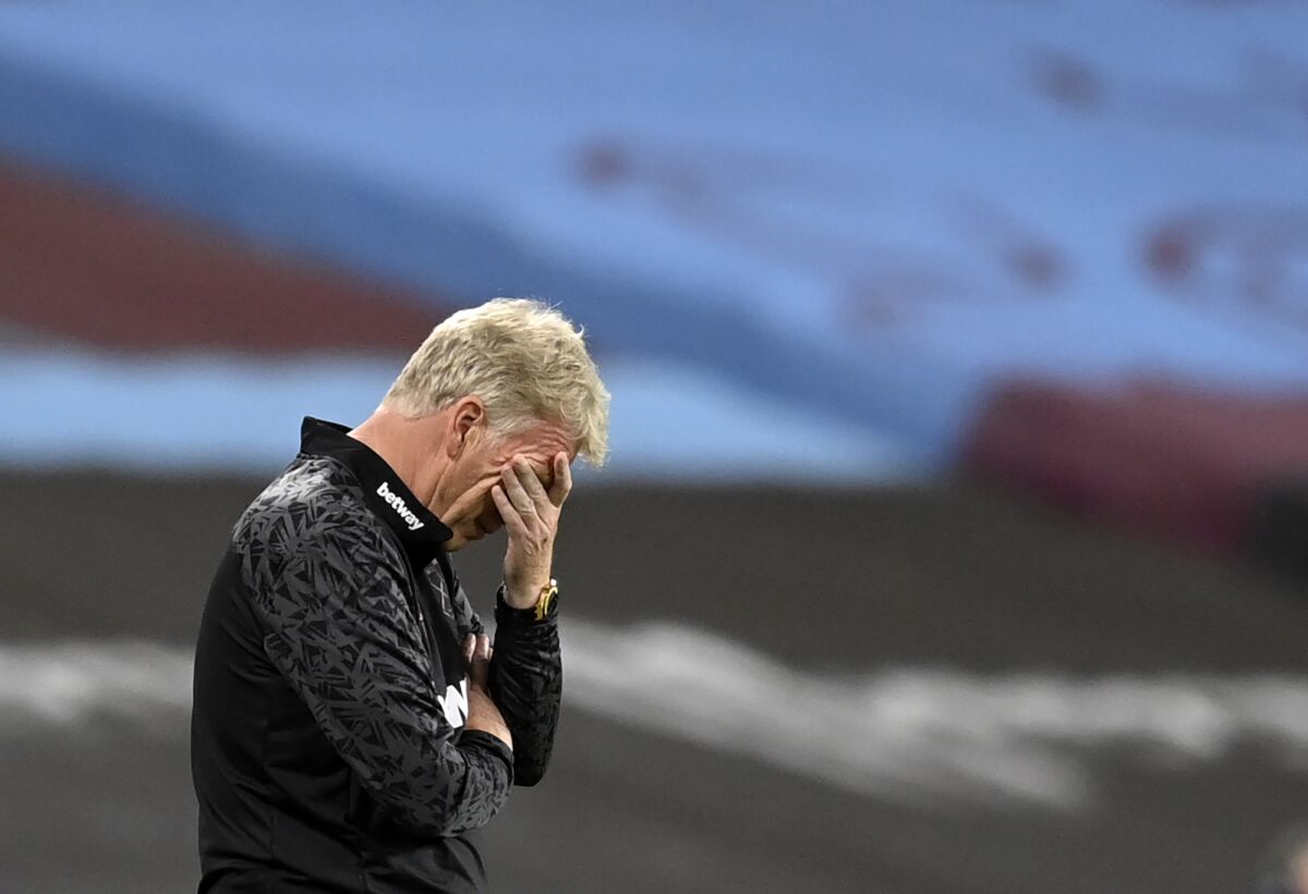 West Ham's manager David Moyes reacts during the English Premier League soccer match between West Ham United and Newcastle United at the London Stadium in London, Saturday, Sept. 12, 2020. (Michael Regan/Pool via AP)