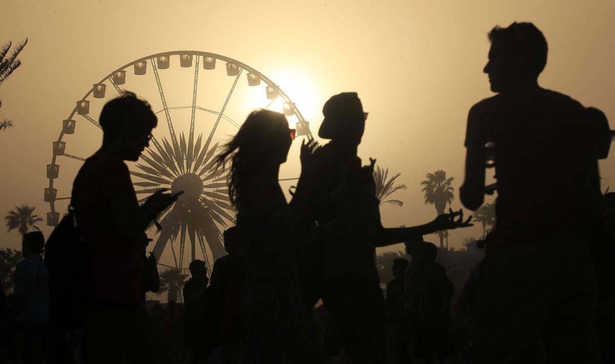 The sun sets on another day of the 2013 edition of the Coachella Valley Music and Arts Festival in Indio.