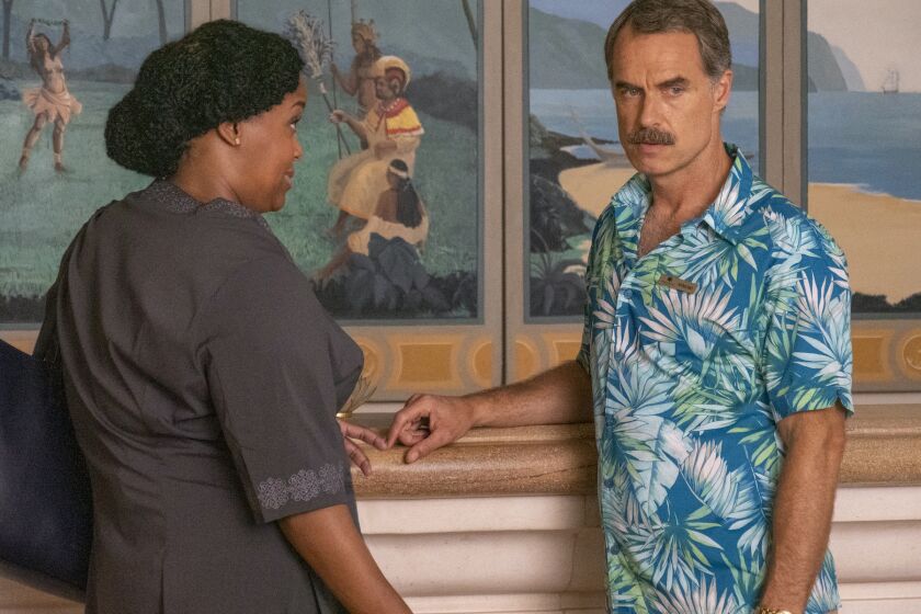 Natasha Rothwell and Murray Bartlett in a scene from "The White Lotus." Credit: Mario Perez/HBO