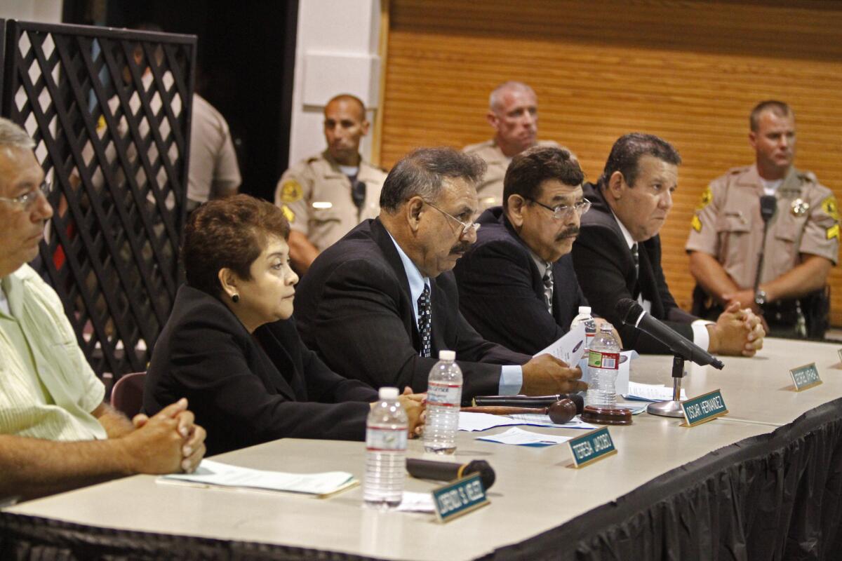 The Bell City Council -- from left, Vice Mayor Teresa Jacobo, Mayor Oscar Hernandez, George Mirabal and Luis Artiga.