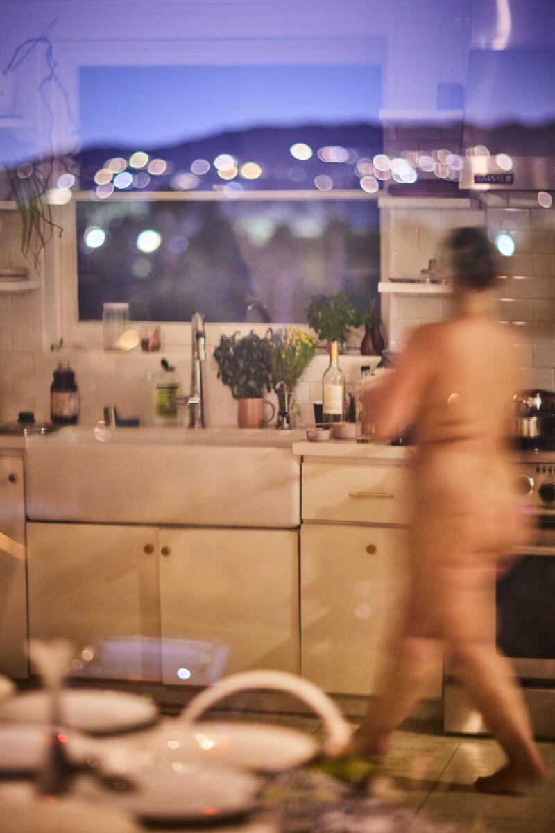 Founder Charlie Ann Max preparing dinner.