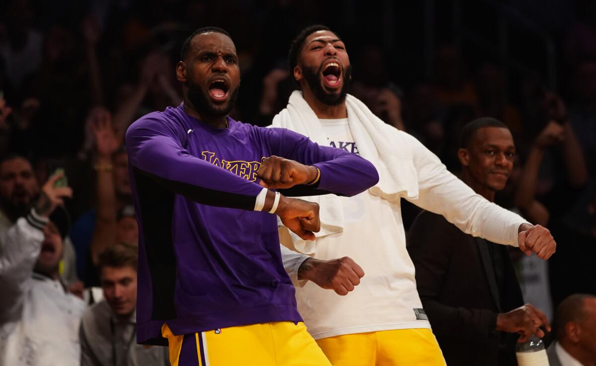 Lakers teammates LeBron James and Anthony Davis had plenty to cheer about during a rout of Memphis in October