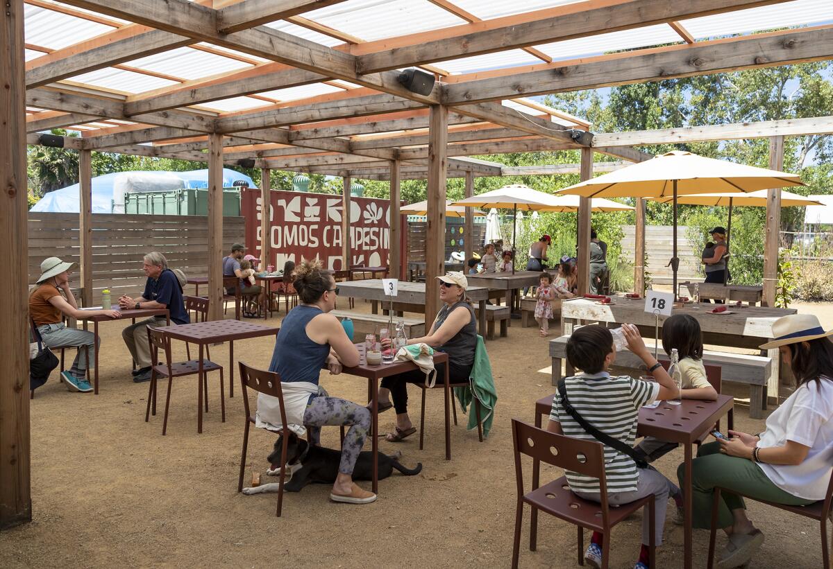 Guests eat lunch at the Campesino Café at the Ecology Center in San Juan Capistrano.