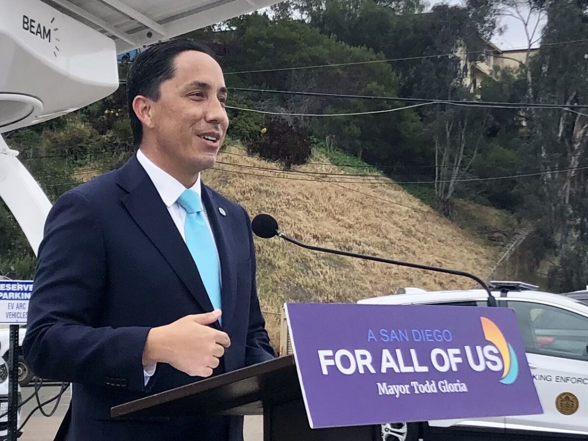 Mayor Todd Gloria at a news conference announcing a pilot program for electric vehicle charging.