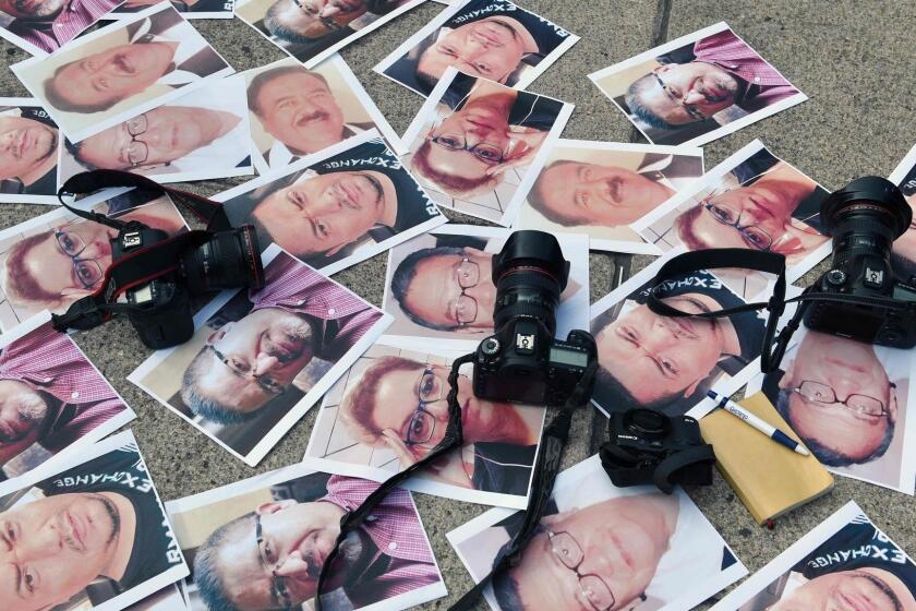 TOPSHOT - Cameras and pictures of journalists recently murdered in different Mexican states are placed at Independence Angel square during a protest by journalists in Mexico City on May 16, 2017. Mexico ranks third in the world for the number of journalists killed, after Syria and Afghanistan, according to media rights group Reporters Without Borders (RSF). / AFP PHOTO / YURI CORTEZYURI CORTEZ/AFP/Getty Images ** OUTS - ELSENT, FPG, CM - OUTS * NM, PH, VA if sourced by CT, LA or MoD **