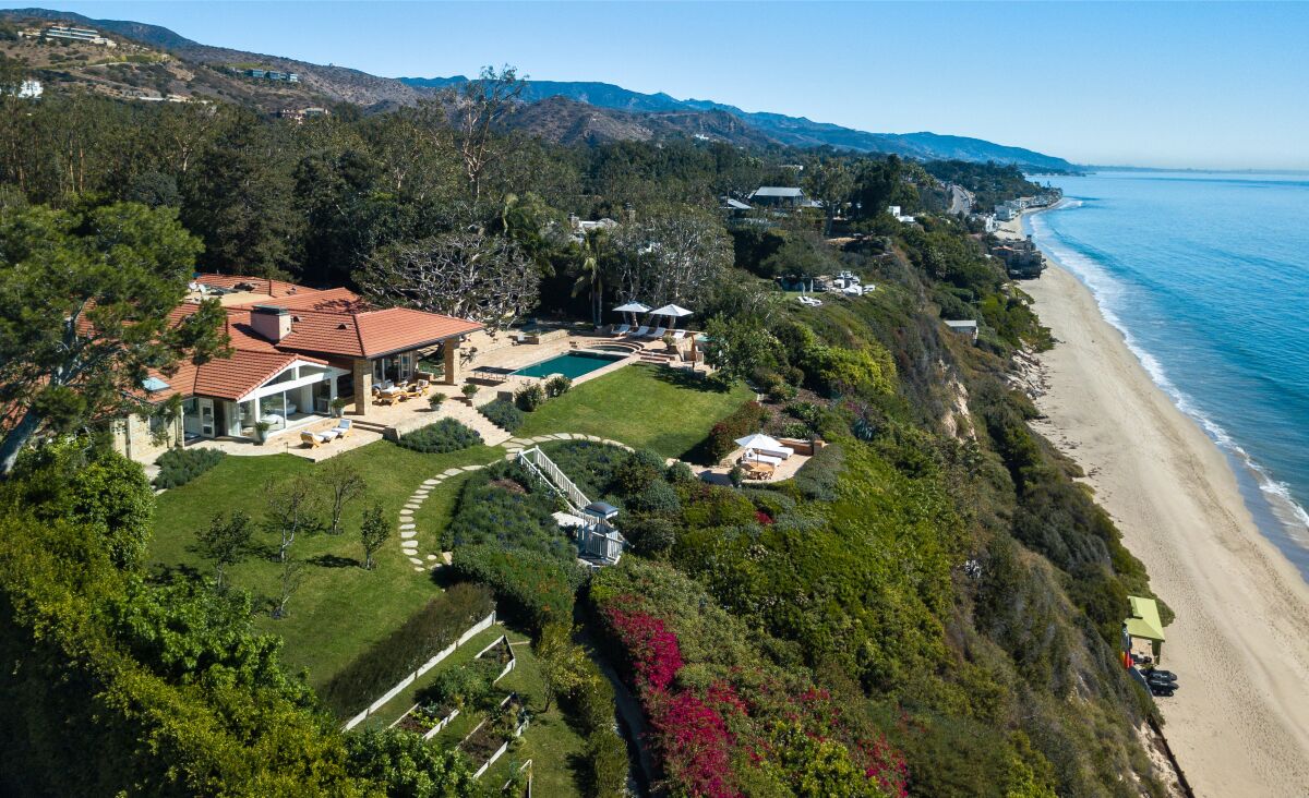 The three-acre spread above Malibu's Paradise Cove includes a main house, a guesthouse and a guardhouse.