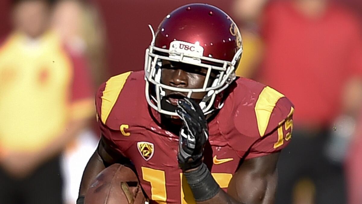 USC wide receiver Nelson Agholor runs with the ball during a game against Arizona State on Oct. 4, 2014.