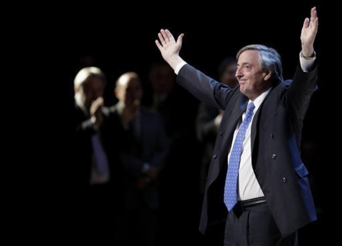 FILE - In this May 14, 2009 file photo, Argentina's former President Nestor Kirchner greets supporters during his congressional campaign in La Plata, Argentina. According to state television in Argentina, Nestor Kirchner died on Wednesday Oct. 27, 2010 of a heart attack at age 60. (AP Photo/Natacha Pisarenko, File)