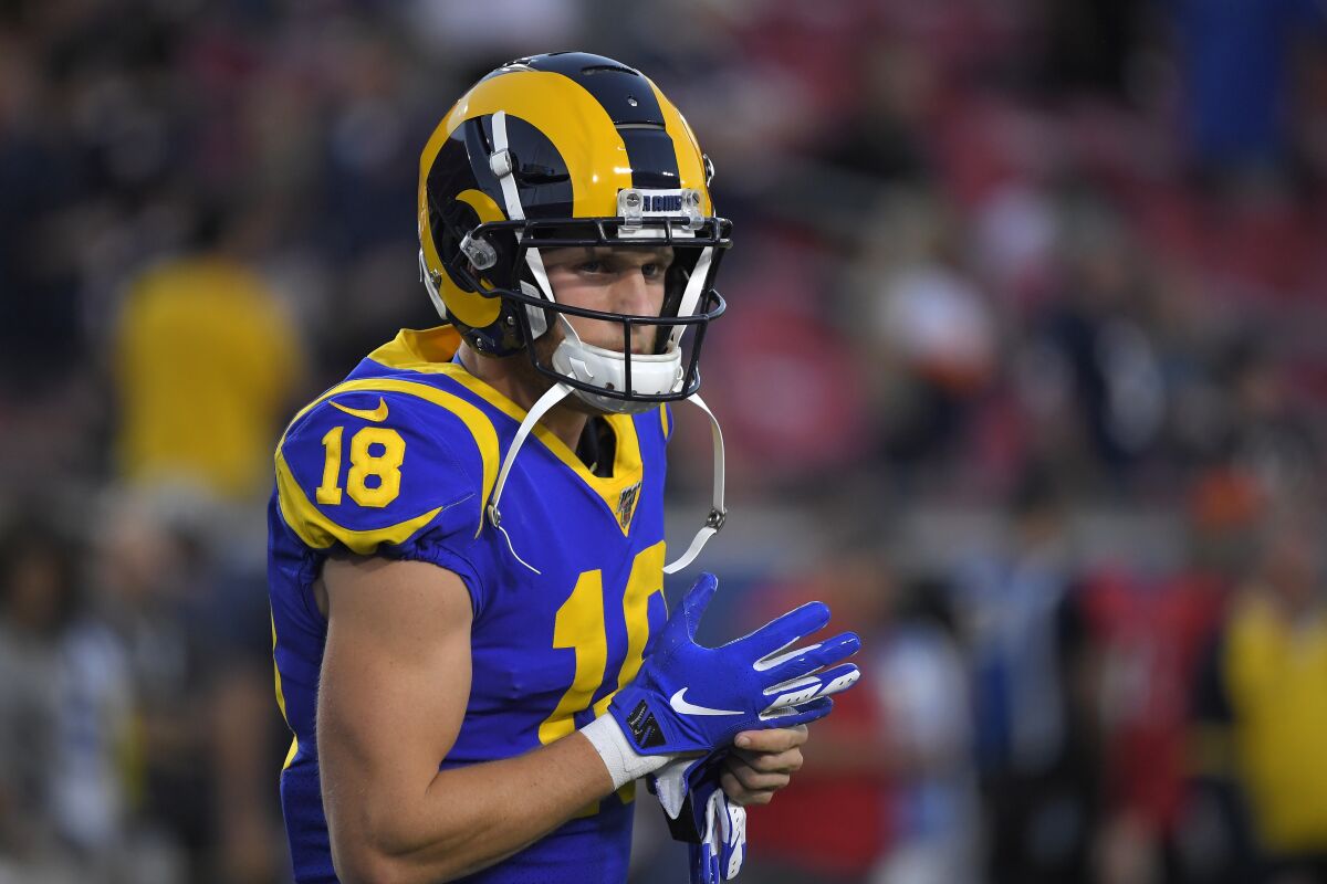 Rams wide receiver Cooper Kupp warms up before a game