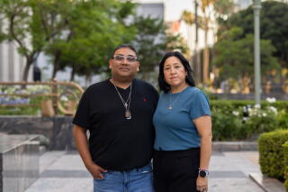 Jerry and Veronica Mata stand in front of the Spring Street Courthouse on Thursday, July 17, 2025 in Los Angeles.