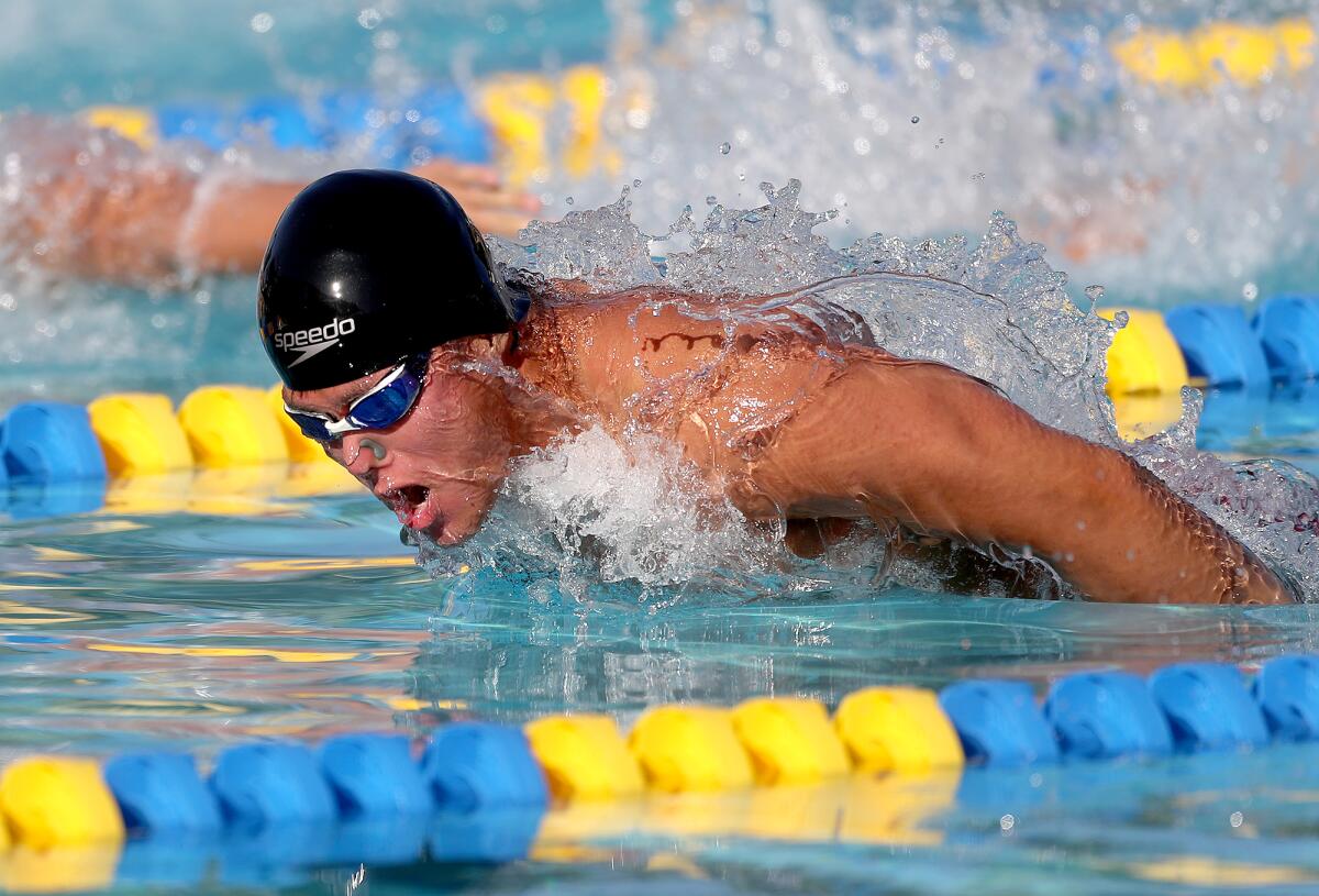 Sage Hill's Ryan Chang swims the boys' 100 butterfly in the Division 2 swimming championships on Friday.