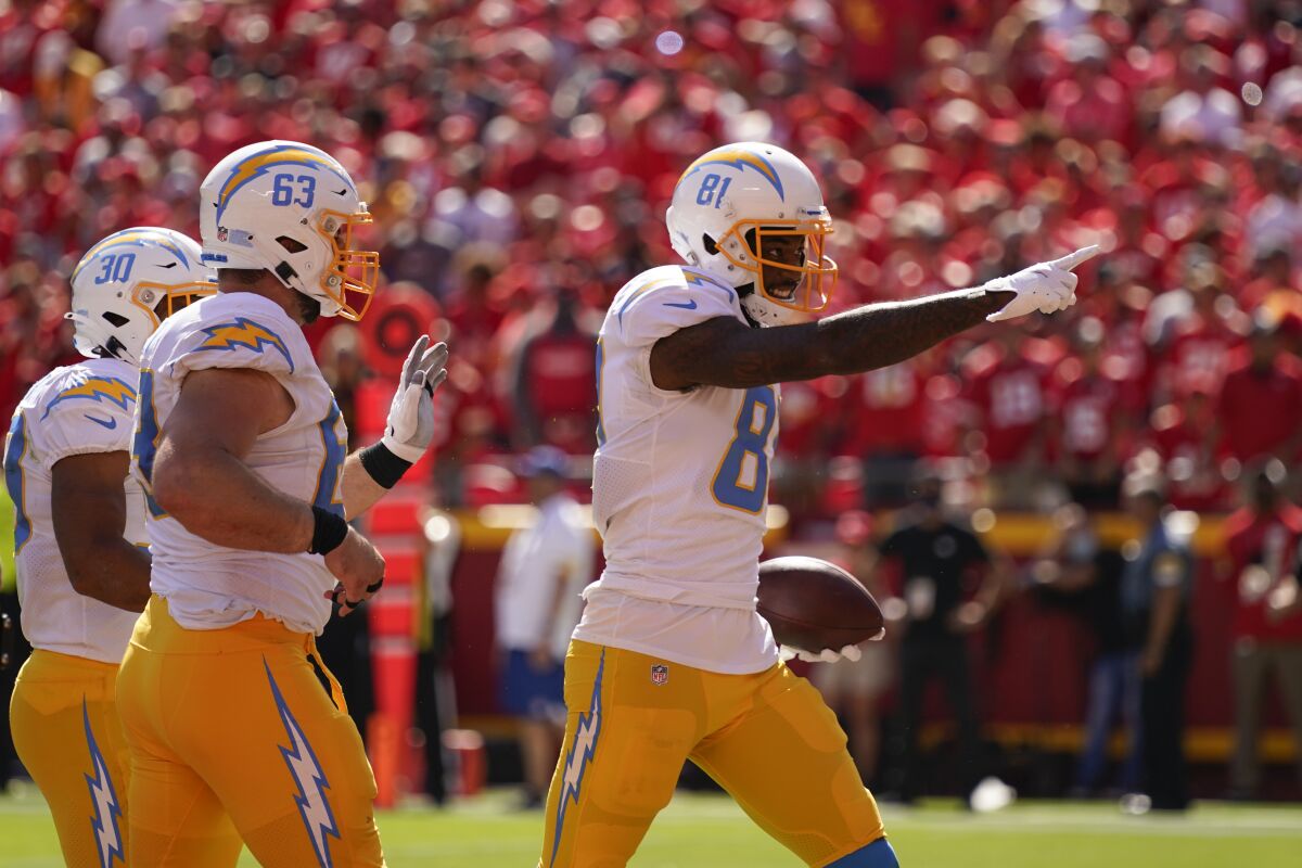 Chargers' Mike Williams points up after a touchdown reception.