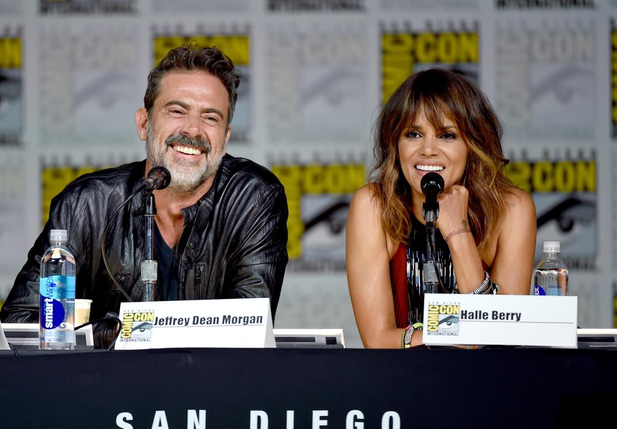 Jeffrey Dean Morgan and Halle Berry onstage for the "Extant" panel during Comic-Con International 2015 in San Diego.