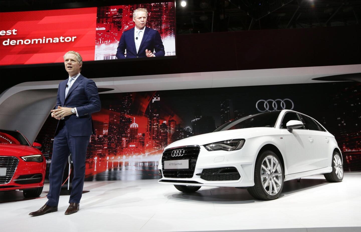 Scott Keogh, president of Audi America, addresses the media alongside the new A3 TDI Sportback at the New York International Auto Show.
