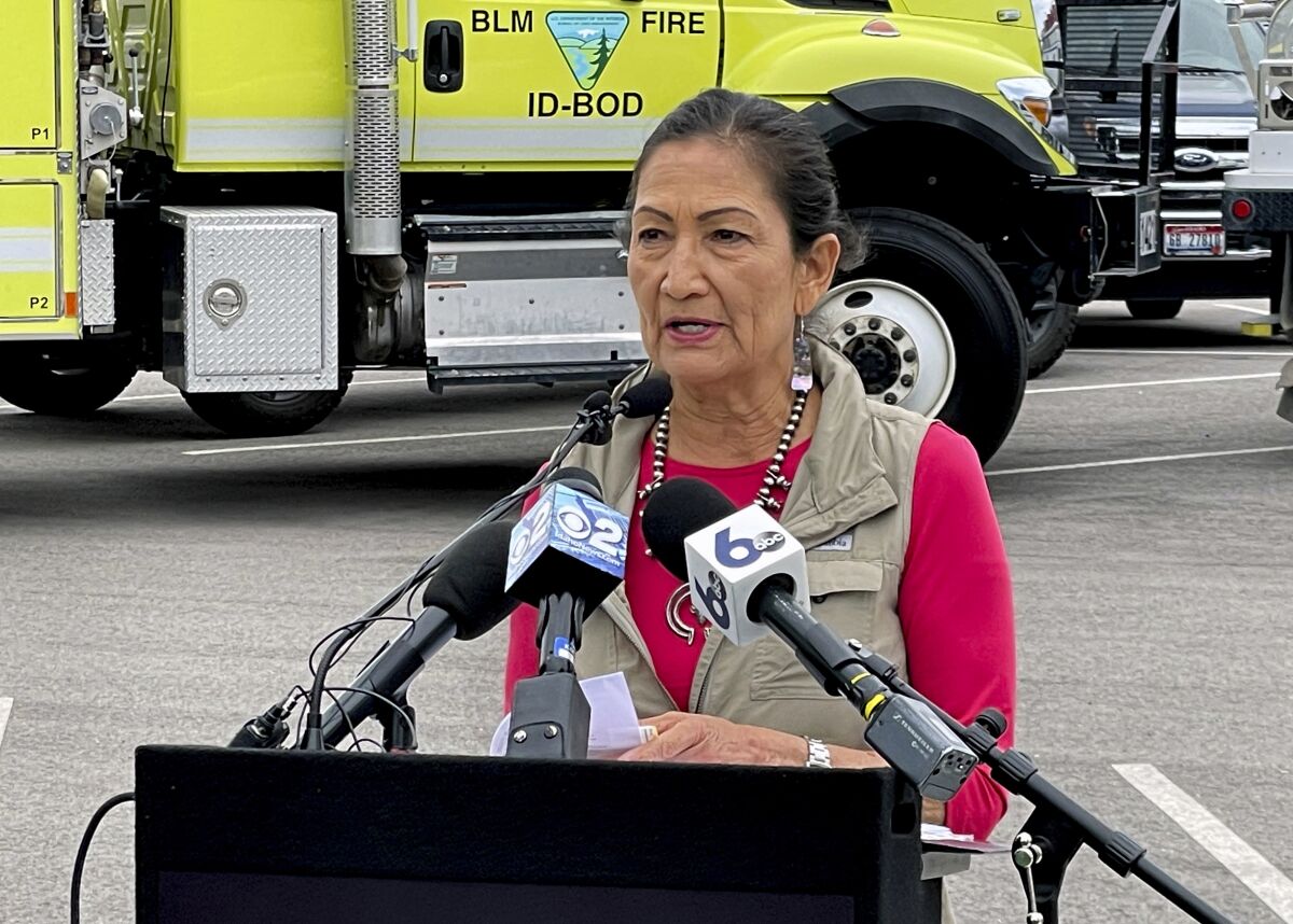 Interior Secretary Deb Haaland speaks at the National Interagency Fire Center on Friday, June 17, 2022, in Boise, Idaho. Haaland announced the U.S. is adding $103 million this year for wildfire risk reduction and burned-area rehabilitation throughout the country as well as establishing an interagency wildland firefighter health and well-being program. (AP Photo/Keith Ridler)