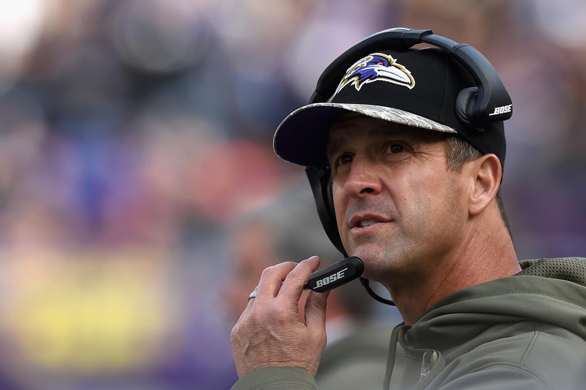 Baltimore Coach John Harbaugh looks on Sunday against the Tennessee Titans at M&T Bank Stadium.