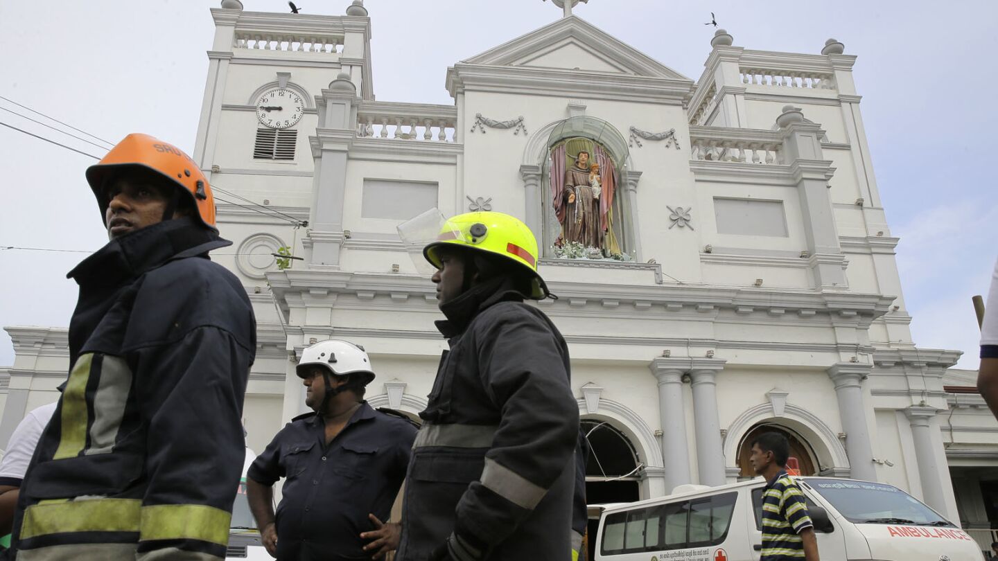 Sri Lankan firefighters work the scene after an explosion at St. Anthony's Shrine in Colombo.