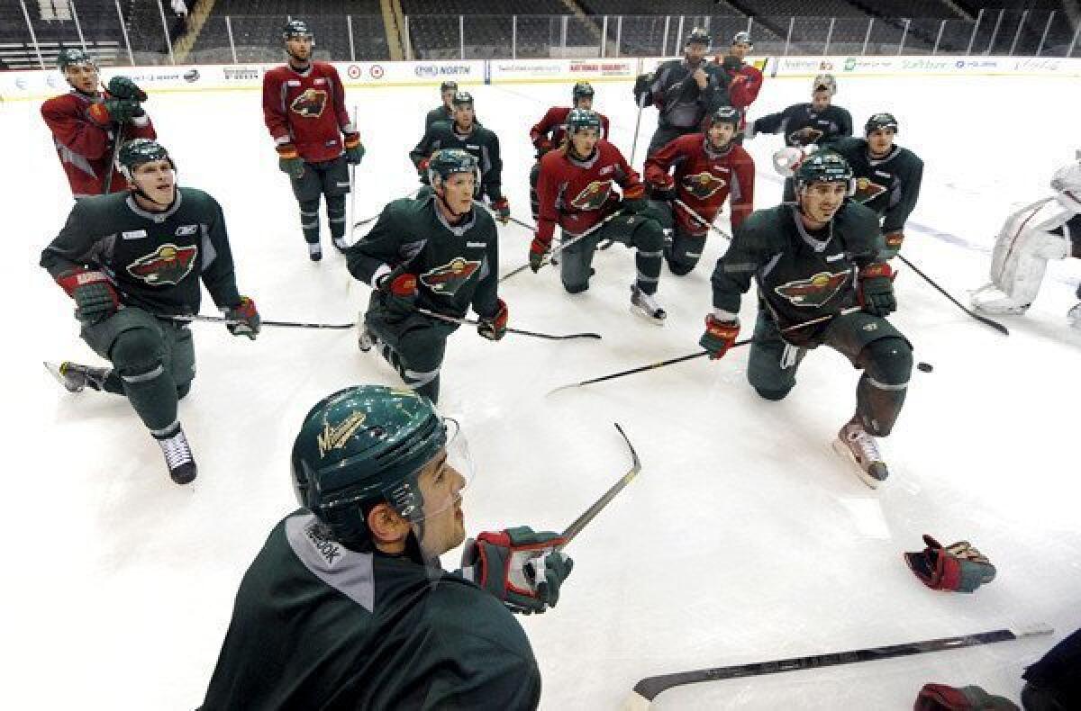 Minnesota Wild players gather for an informal workout as they prepare for the NHL lockout to be lifted and a new season to begin.