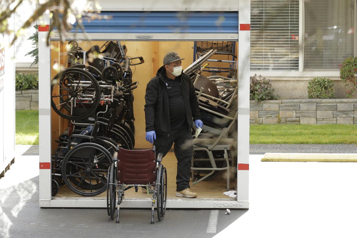 A worker at the Life Care Center