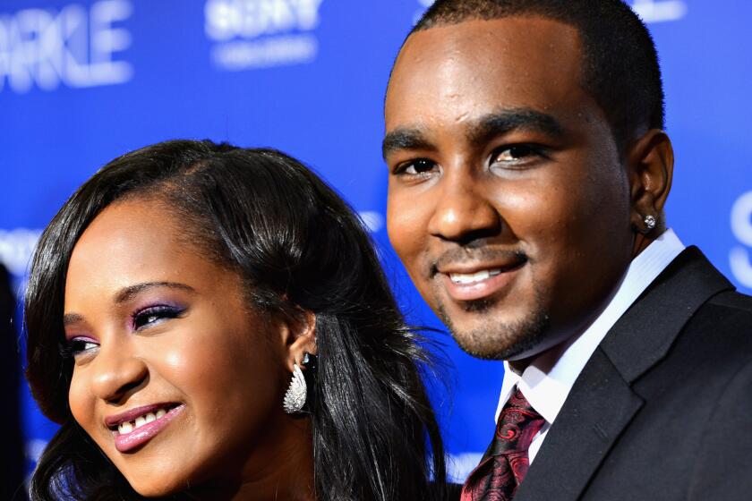 Nick Gordon has had Bobbi Kristina Brown's name tattooed on his left forearm. His girlfriend, the only child of the late Whitney Houston and Bobby Brown, has been hospitalized in a coma since being found unresponsive on Jan. 31.