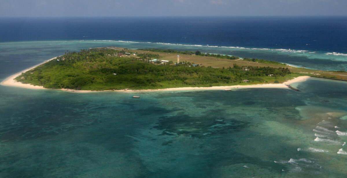 An aerial view of Pagasa Island, part of the disputed Spratly group of islands, in the South China Sea, located off the coast of western Philippines. China has deployed two batteries of sophisticated surface-to-air missile launchers to a disputed island in the South China Sea, Taiwan said.