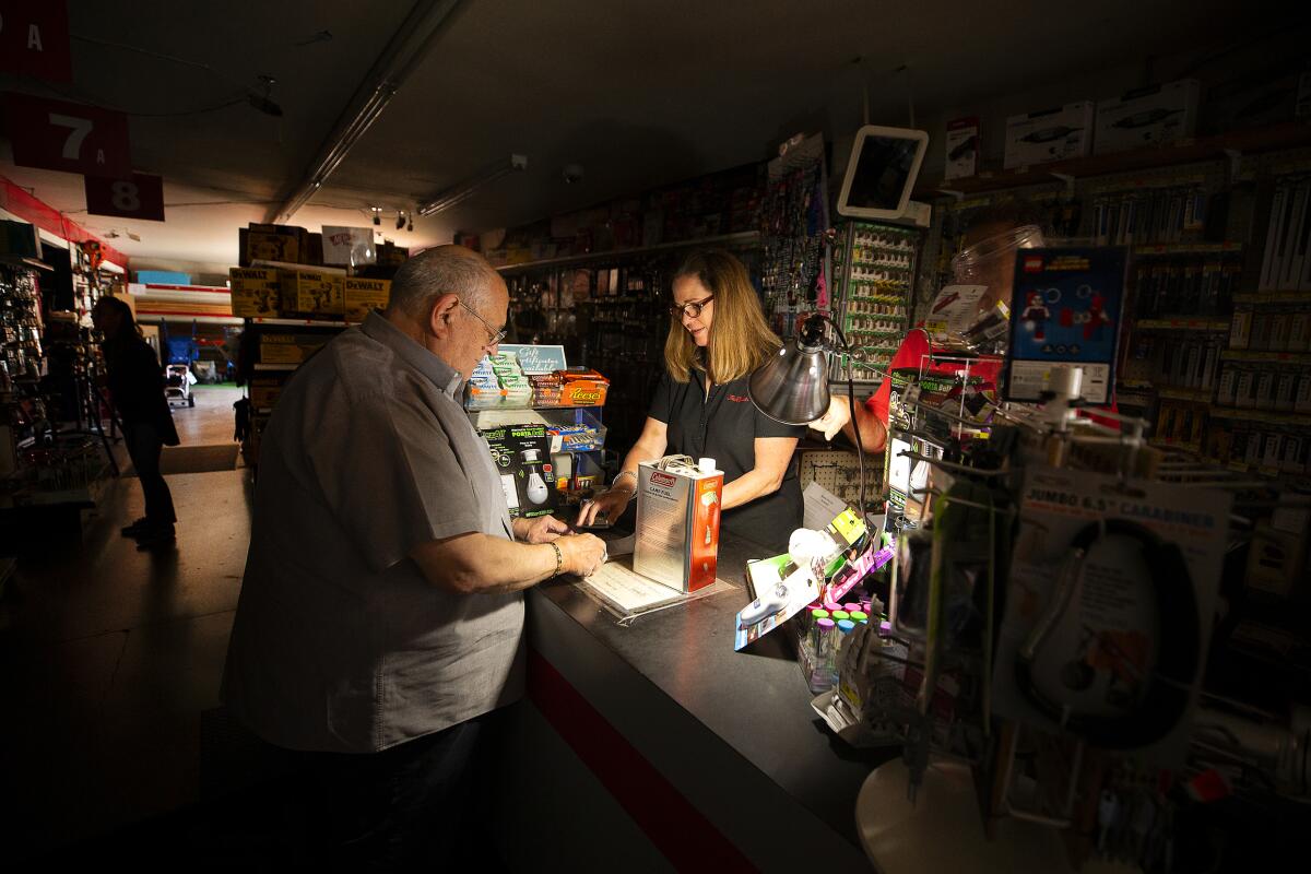 Tom Hyde buys a can of fuel for his Coleman camp stove in Santa Rosa during an October 2019 power outage.