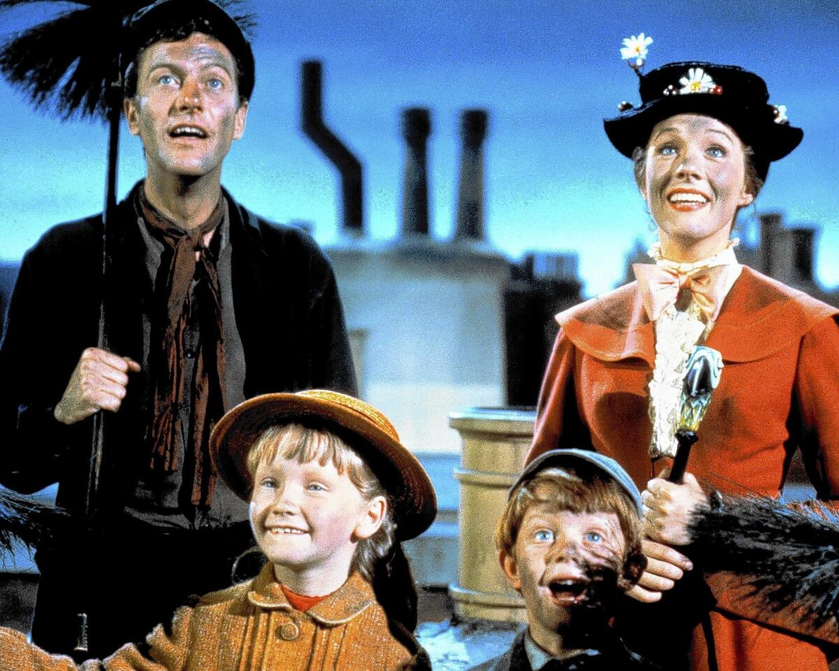 Dick Van Dyke, left, Karen Dotrice, Matthew Garber and Julie Andrews in "Mary Poppins," 1964.