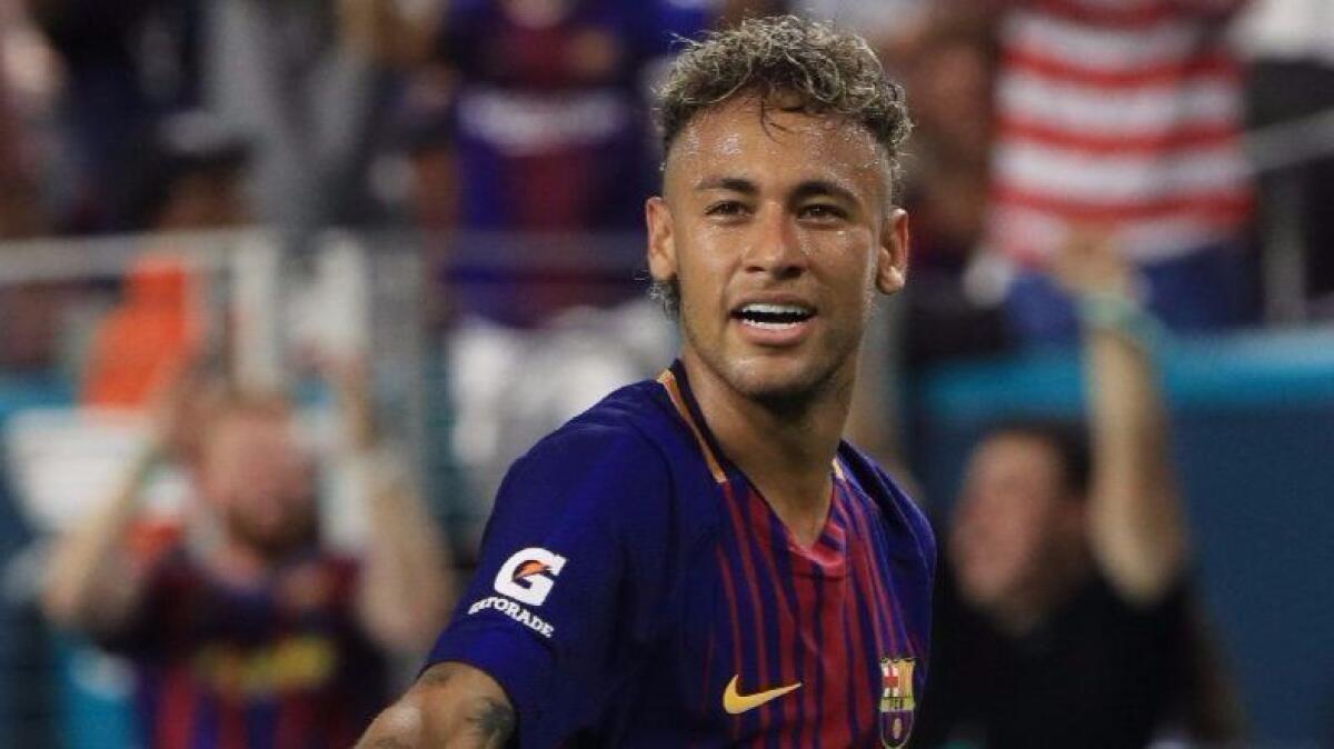 Neymar of Barcelona plays against Real Madrid in the International Champions Cup match in Miami Gardens, Fla, on July 29.